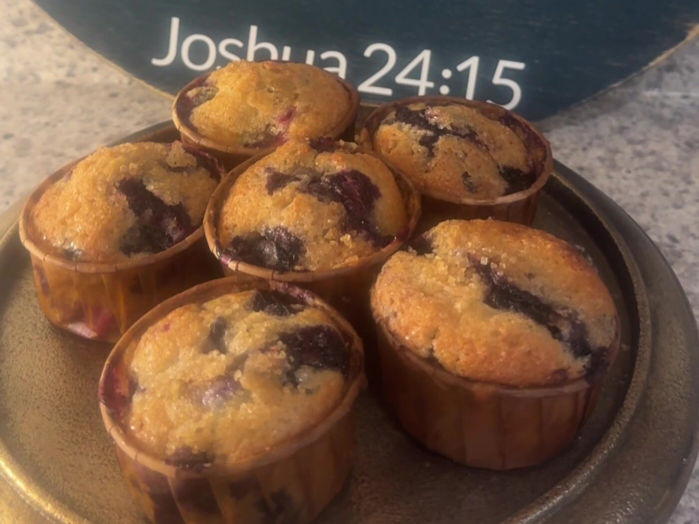 Nana&rsquo;s blueberry jumbo muffins on a brass footed dish